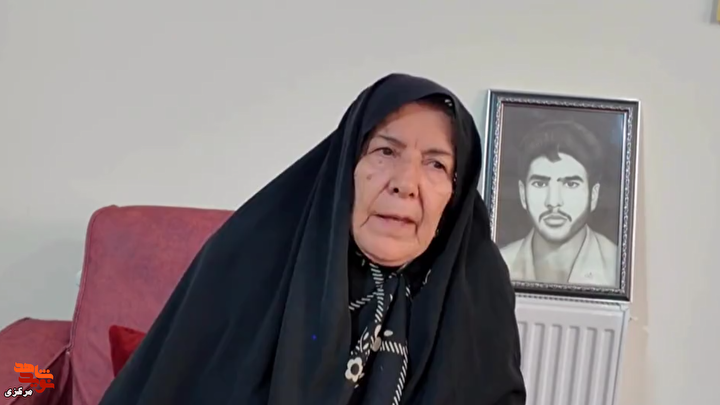 صلابت مادرانه در مراسم وداع؛ روایتی از خاکسپاری شهید ایوقی
